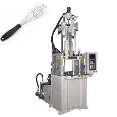 Vertikale Kunststoffspritzgießmaschine zur Herstellung von Eierschlägern